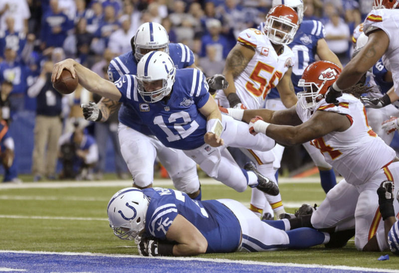 After scoring a touchdown against the Kansas City Chiefs, Indianapolis Colts  quarterback Andrew Luck (12) celebrates during the second half of an NFL  wild-card playoff football game Saturday, Jan. 4, 2014, in