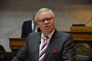 Senator facing theft investigation says he will resign if reelected