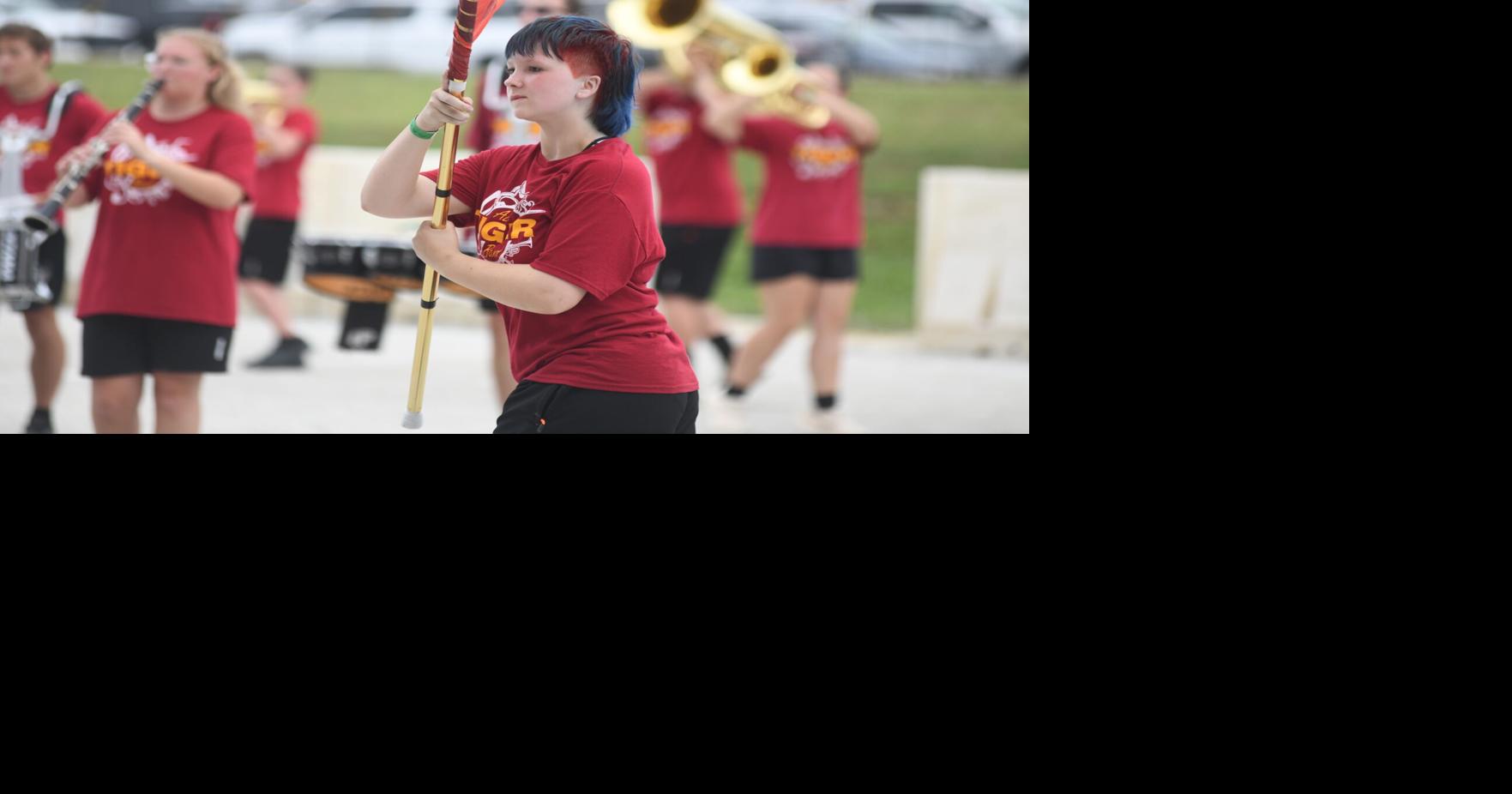 Alex band shows poise, polish in Band Day performance