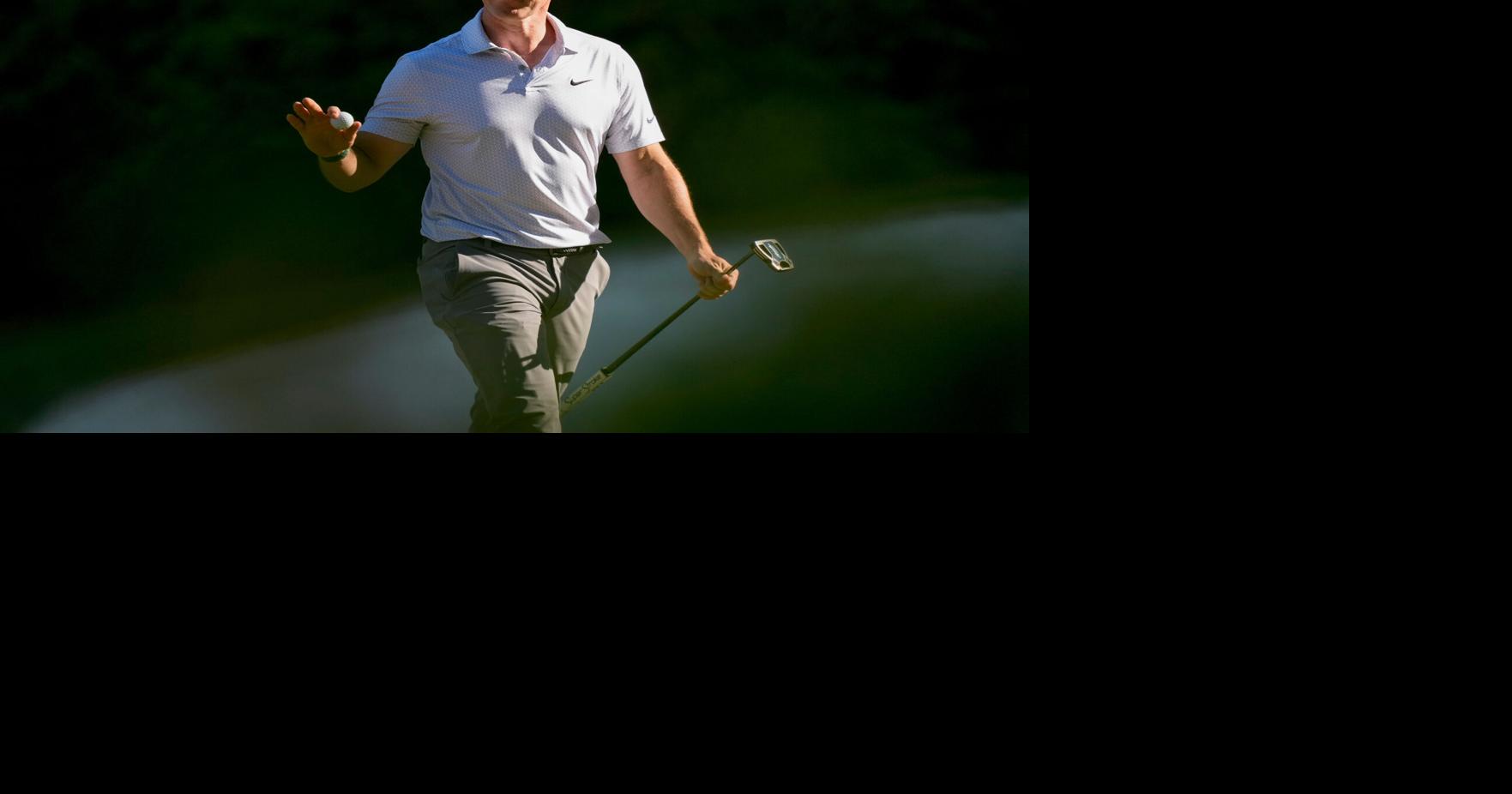 McIlroy stumbles at Masters, share lead with Young