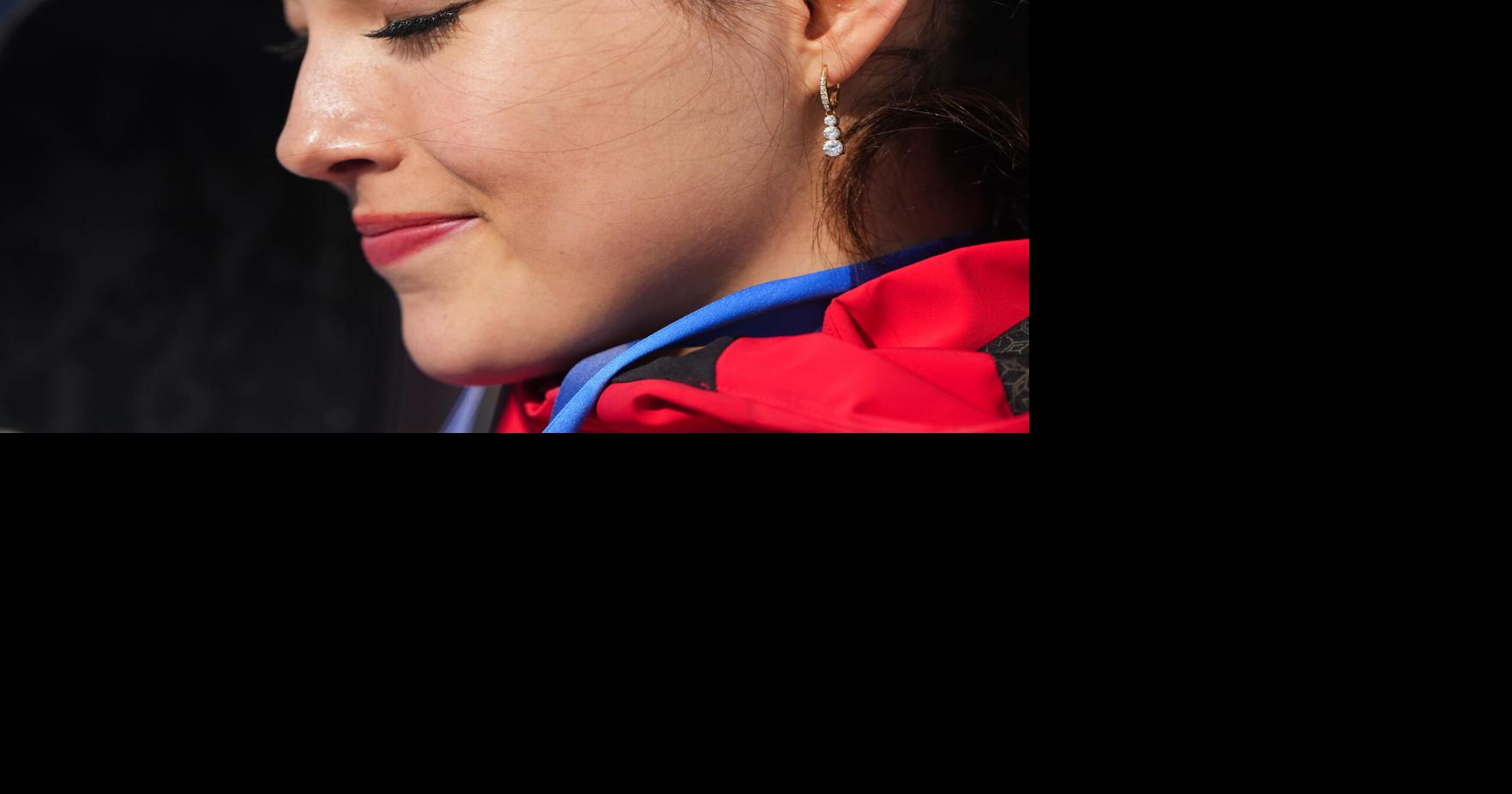 Eileen Gu in tears after defending her Olympic halfpipe title, learning of her grandmother&rsquo;s death
