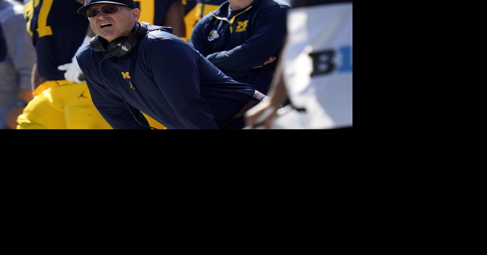 Michigan responds to Big Ten, saying commissioner doesn't have discipline authority, AP sources say