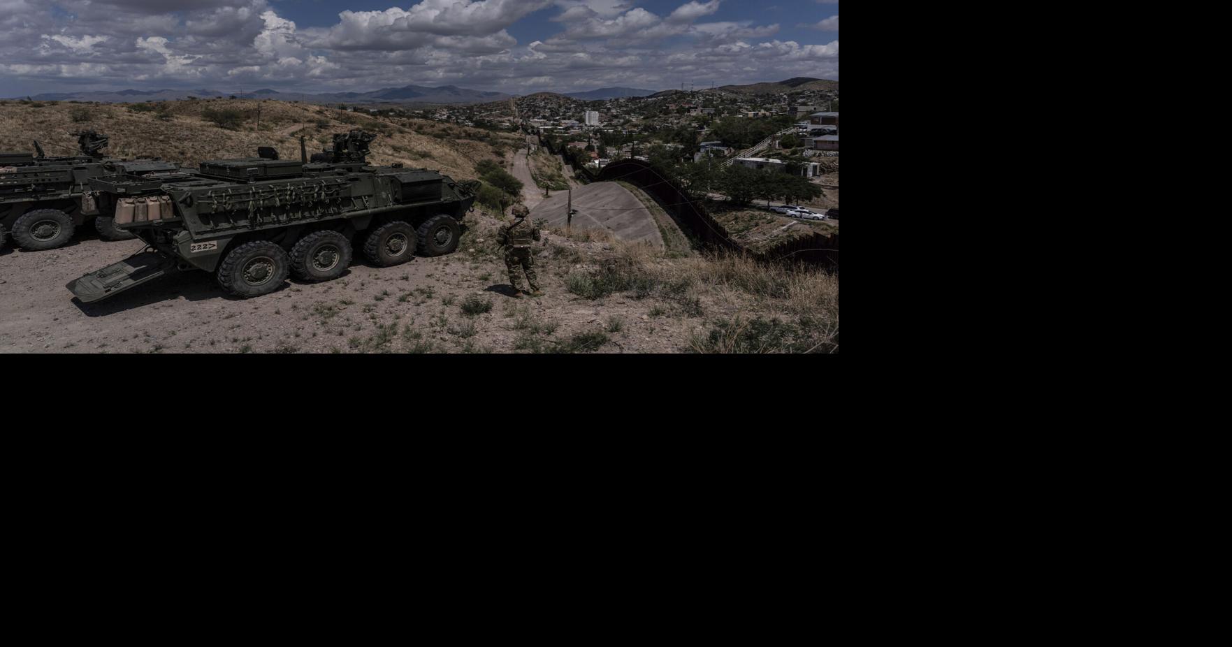 Man halted climbing US-Mexico border wall