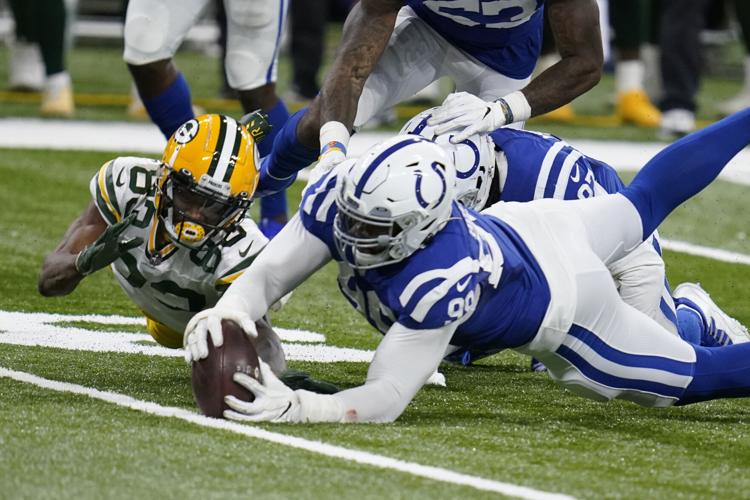 Colts win wild shootout with Packers to stay top AFC South, Sports