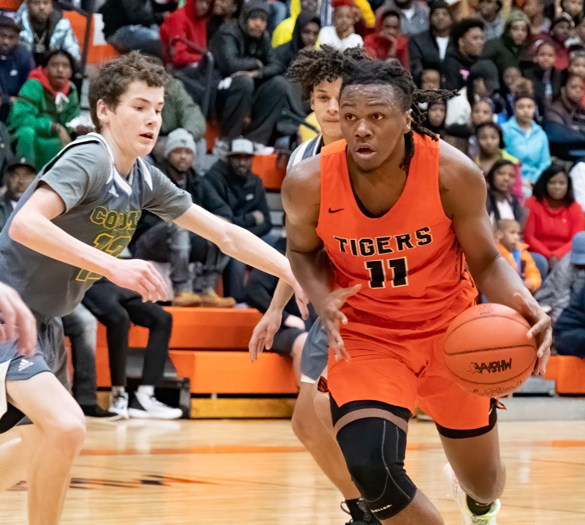 Carlos Johnson S Triple Double Paces Benton Harbor In Win Over