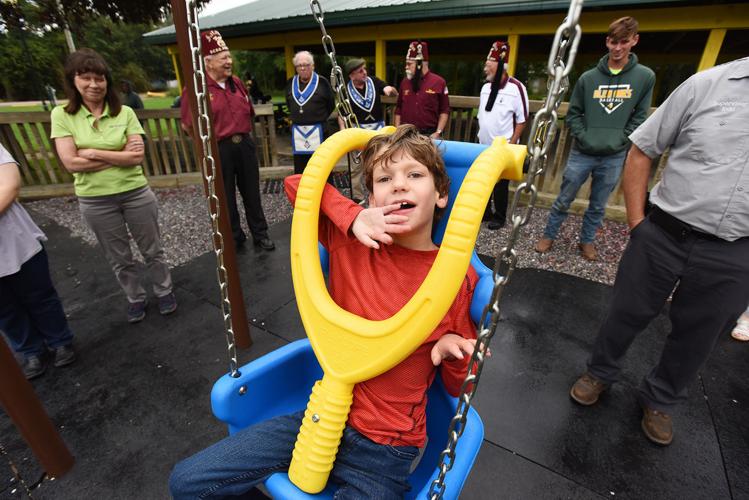Coloma debuts handicapaccessible swings at Randall Park Coloma