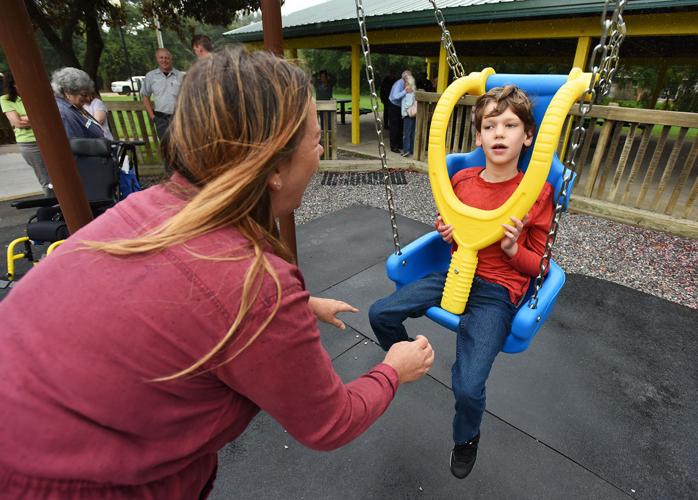 Coloma debuts handicapaccessible swings at Randall Park Coloma