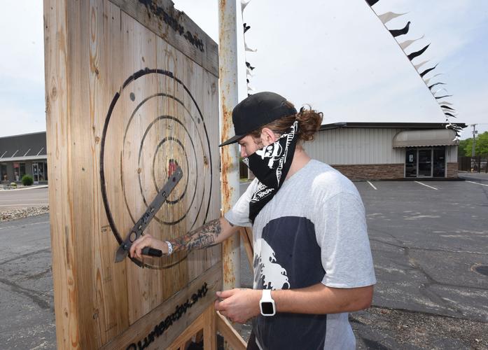 Lumberjax Urban Axe Throwing opens in new, larger location News
