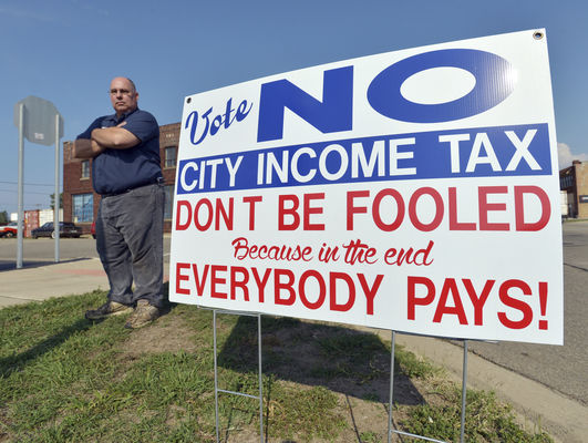 City income tax poses pros, cons