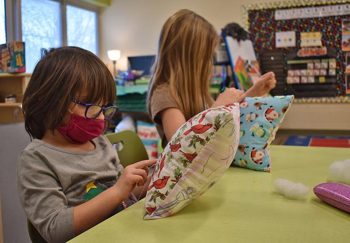 Coloma Elementary School students get festive with holiday pillows Coloma