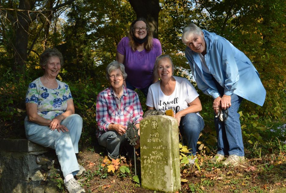 DAR members clean grave markers Features