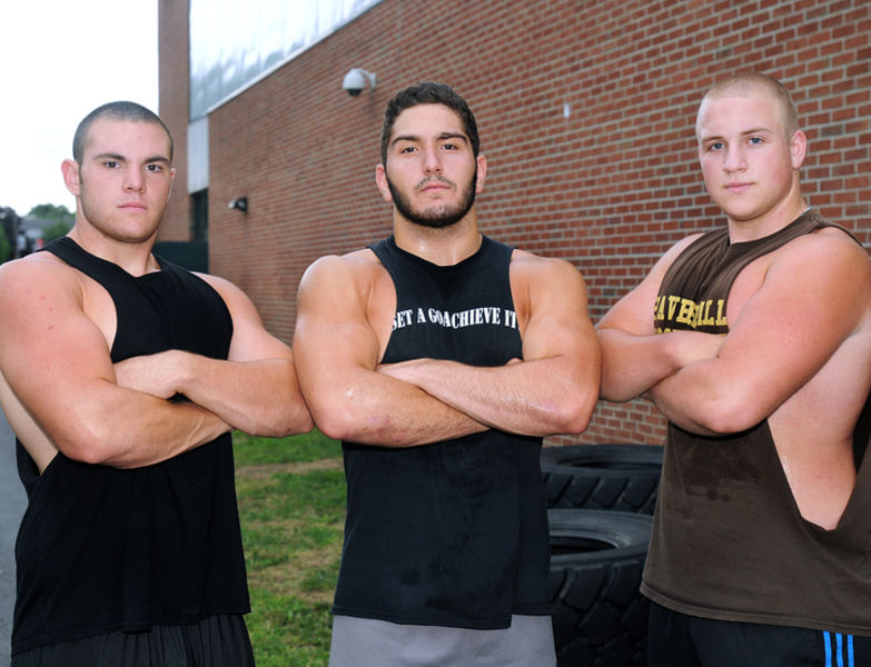 Senior captains from left, Phil Pancini, Samie Al-Ziab and Matthew Haskell. take a break from working out.