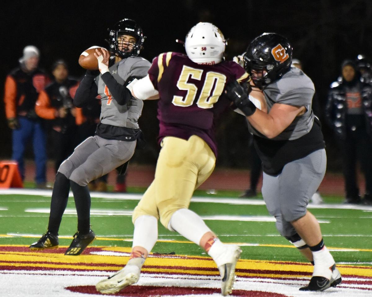The Greater Lawrence Reggies defeated the Whittier Tech. Wildcats 28-22 in their annual Thanksgiving Eve football game.