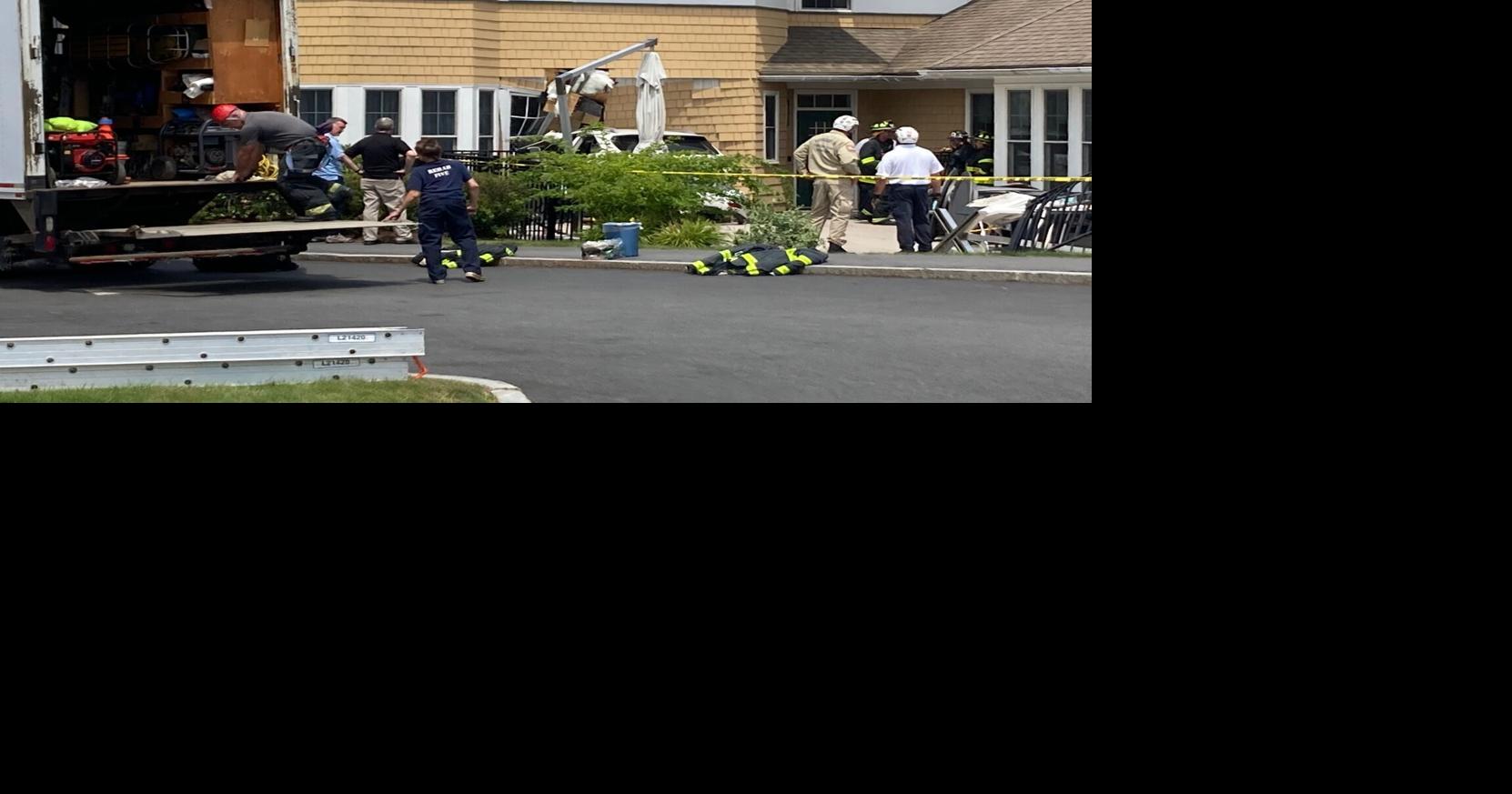 2 injured when car crashes into apartment complex | Local News ...