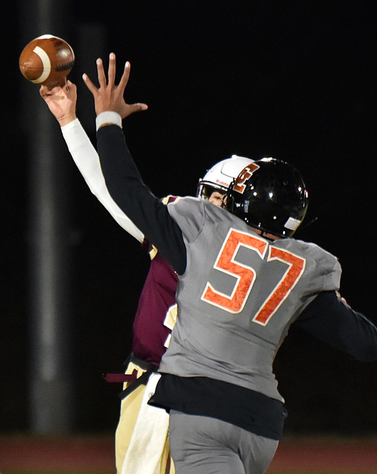 The Greater Lawrence Reggies defeated the Whittier Tech. Wildcats 28-22 in their annual Thanksgiving Eve football game.