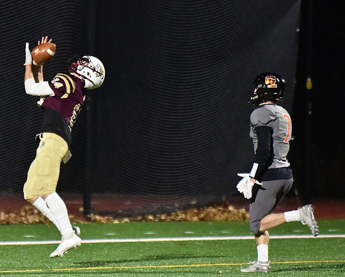 The Greater Lawrence Reggies defeated the Whittier Tech. Wildcats 28-22 in their annual Thanksgiving Eve football game.