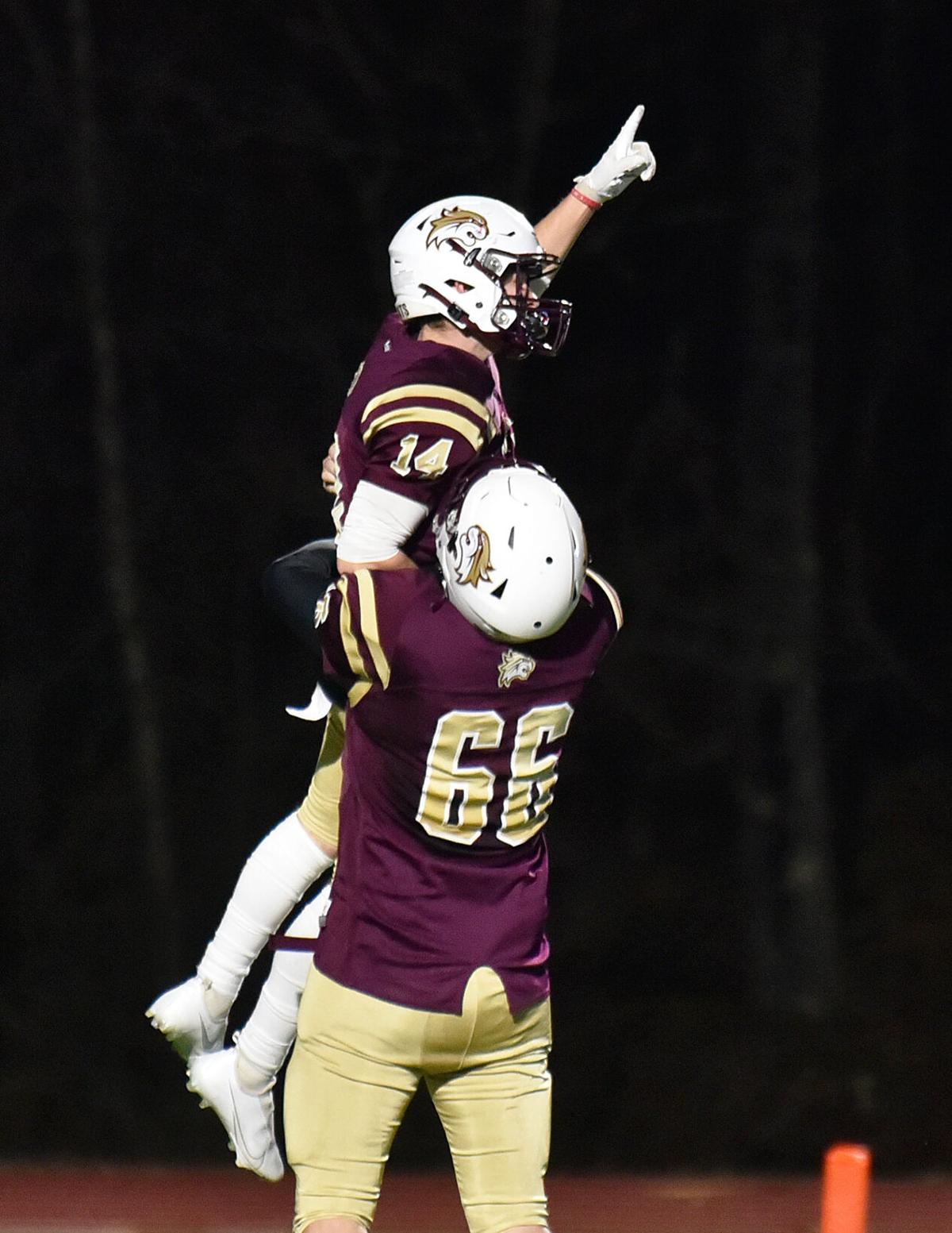 The Greater Lawrence Reggies defeated the Whittier Tech. Wildcats 28-22 in their annual Thanksgiving Eve football game.