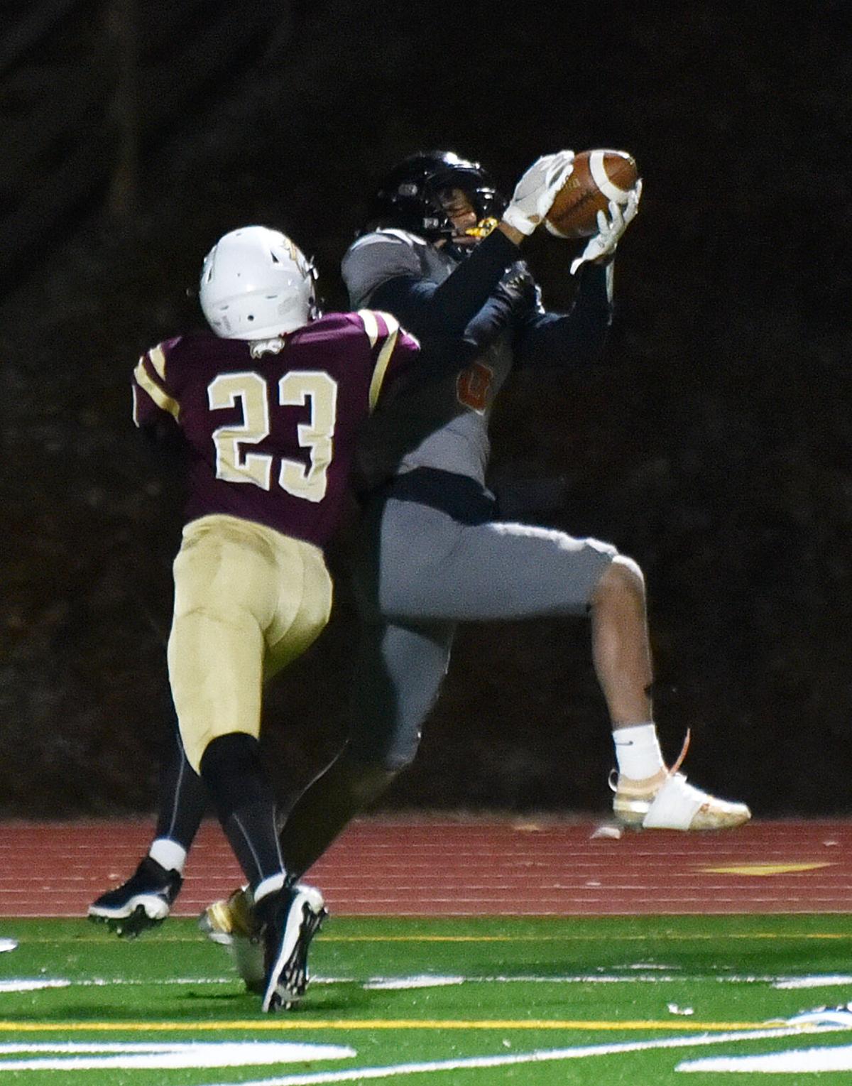 The Greater Lawrence Reggies defeated the Whittier Tech. Wildcats 28-22 in their annual Thanksgiving Eve football game.