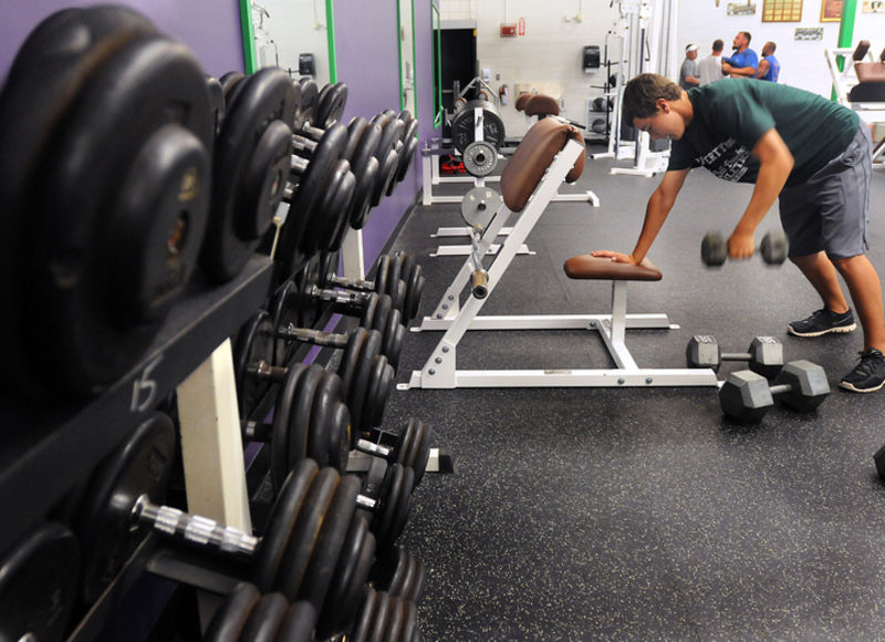 Sophomore Evan Martinez strengthens one arm at a time.
