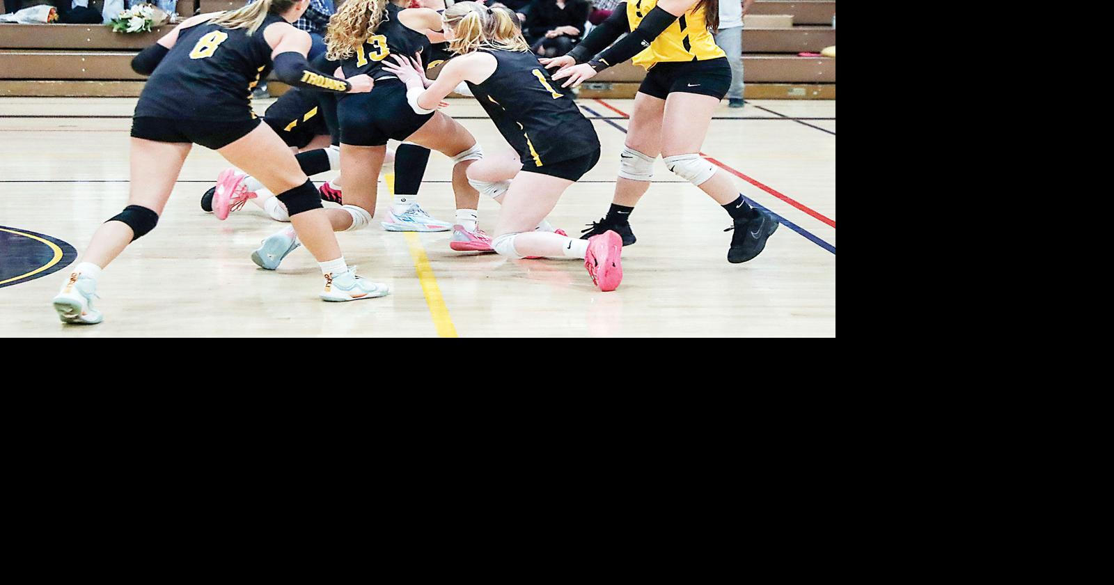 Going out with a bang; Trojan volleyball team ends with big win