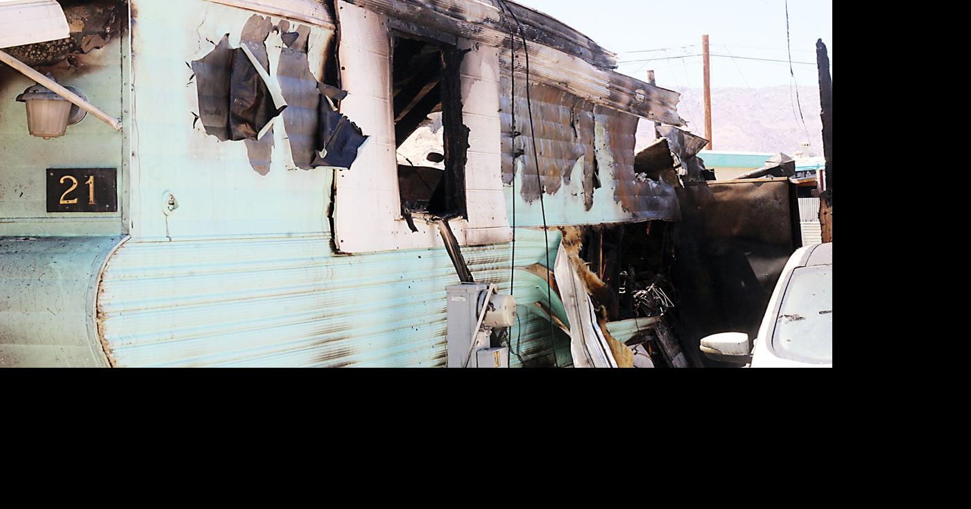 Fire injures woman and burns homes