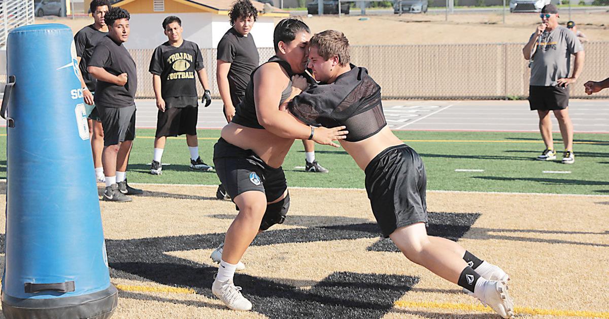 Trojan football brings heat at summer practice