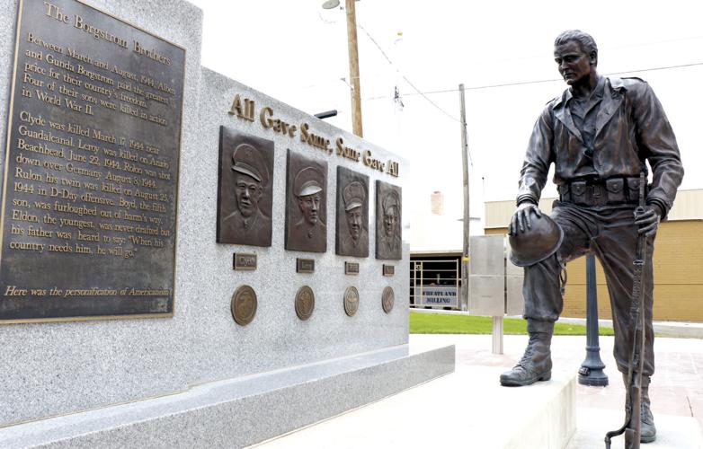 Honoring the fallen Locals working on cemetery memorial for