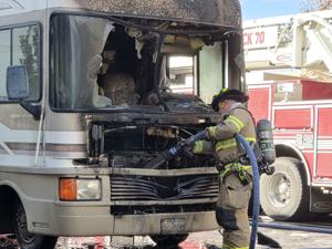 RV driver avoids injury after engine catches fire in while driving in Logan
