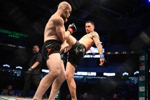 Olsen’s pro debut in MMA cut short by groin kick