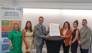 USU President signs hunger initiative as extension launches Food Systems Alliance