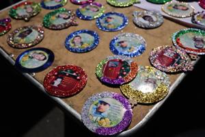 A Christmas tree in Mexico carries the faces of loved ones who never came home