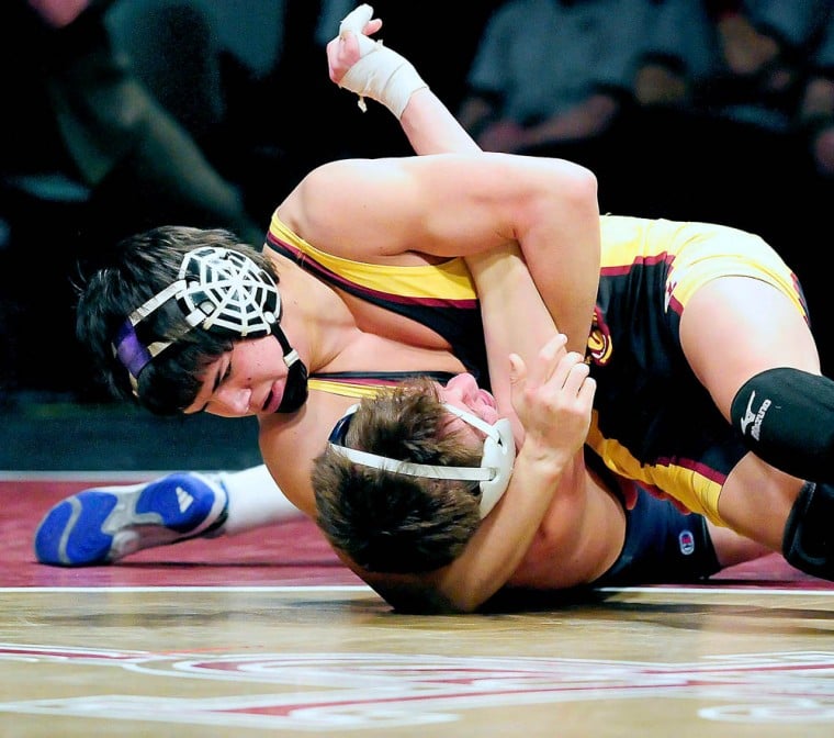 Logans Hinckley, MCs Wells earn sweet redemption at state wrestling tourney Sports hjnews image