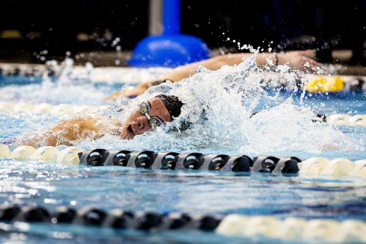 Prep boys swimming: Mustangs capture 4A title in thrilling fashion ...
