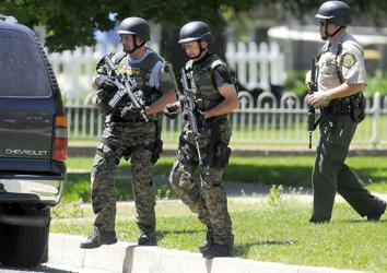 Man surrenders after seven-hour police standoff in Providence ...