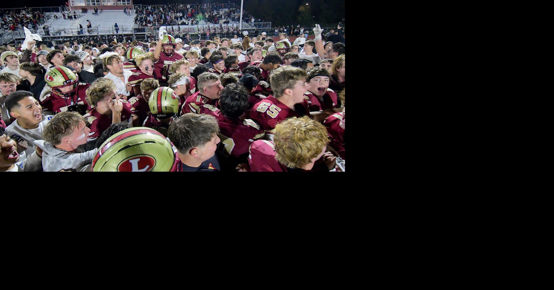 Prep football: Grizz capture region title with massive Senior Night win over Morgan