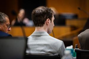 Prosecutors play video in court of suspect in Charlie Kirk's shooting after he turned himself in