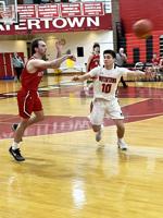 Reading boys hoop team's road win balances out well