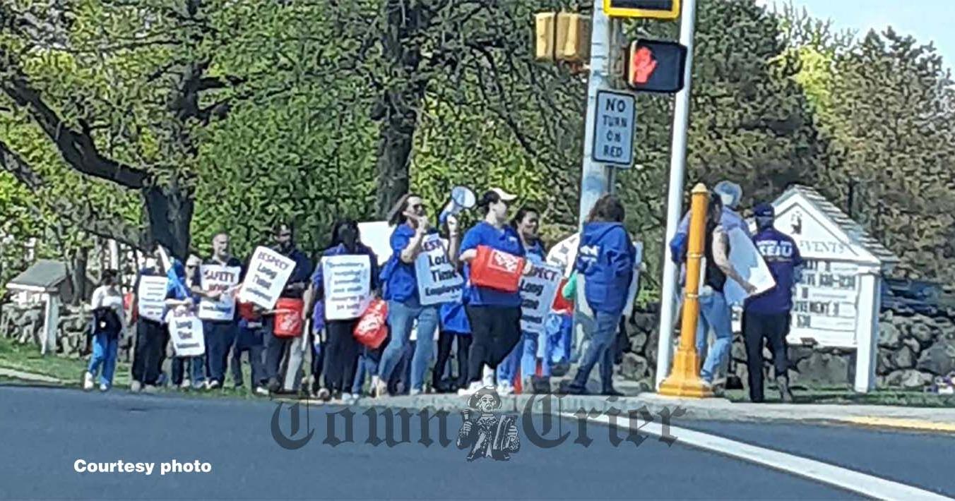 Tewksbury Hospital staff pickets at library - Vimarsana News