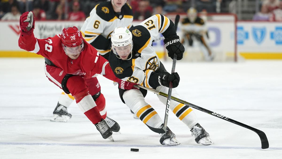 Boston Bruins center Charlie Coyle (13) looks on during the second