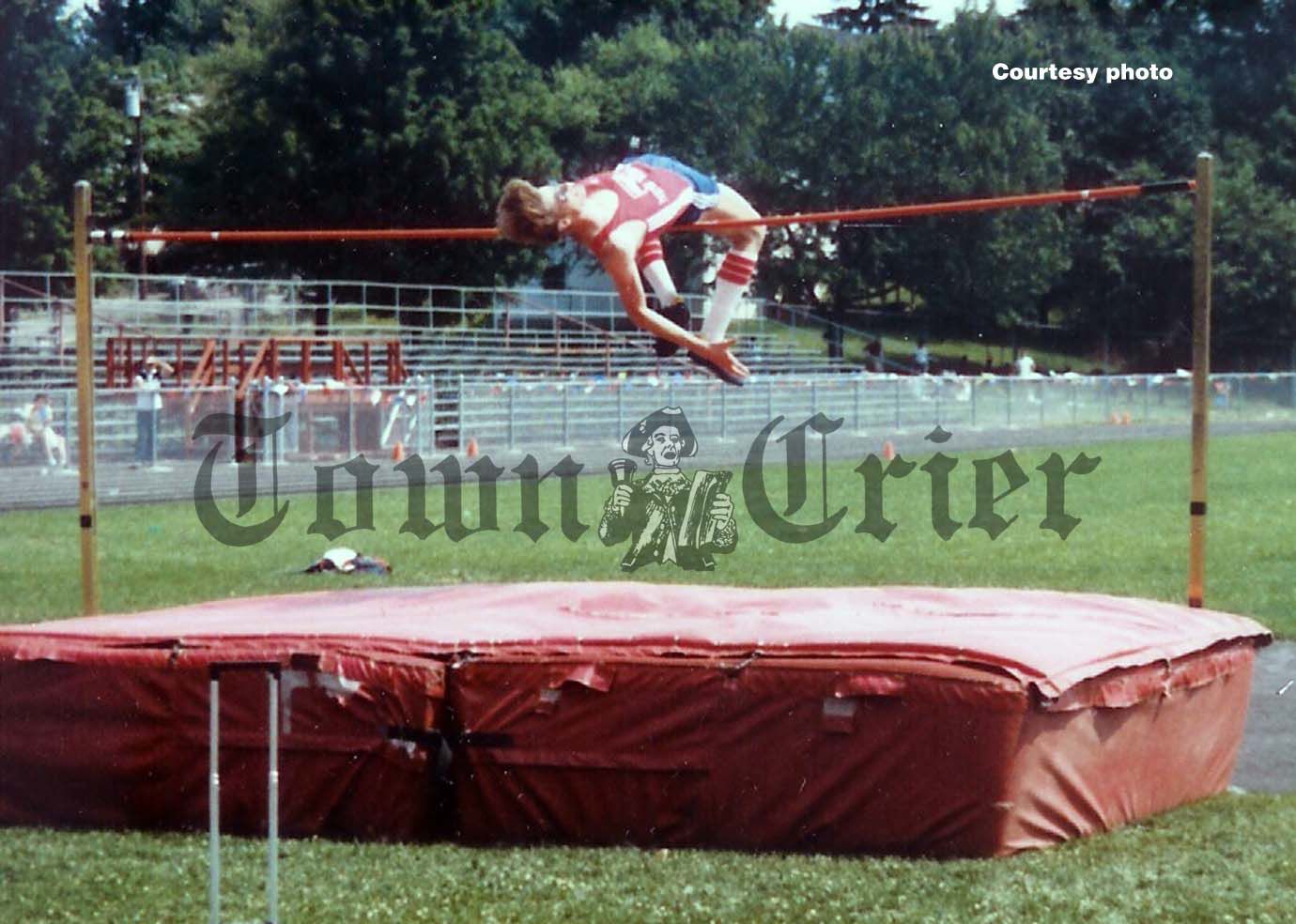 Jumping over the bar as a family: Current WHS Assistant Track