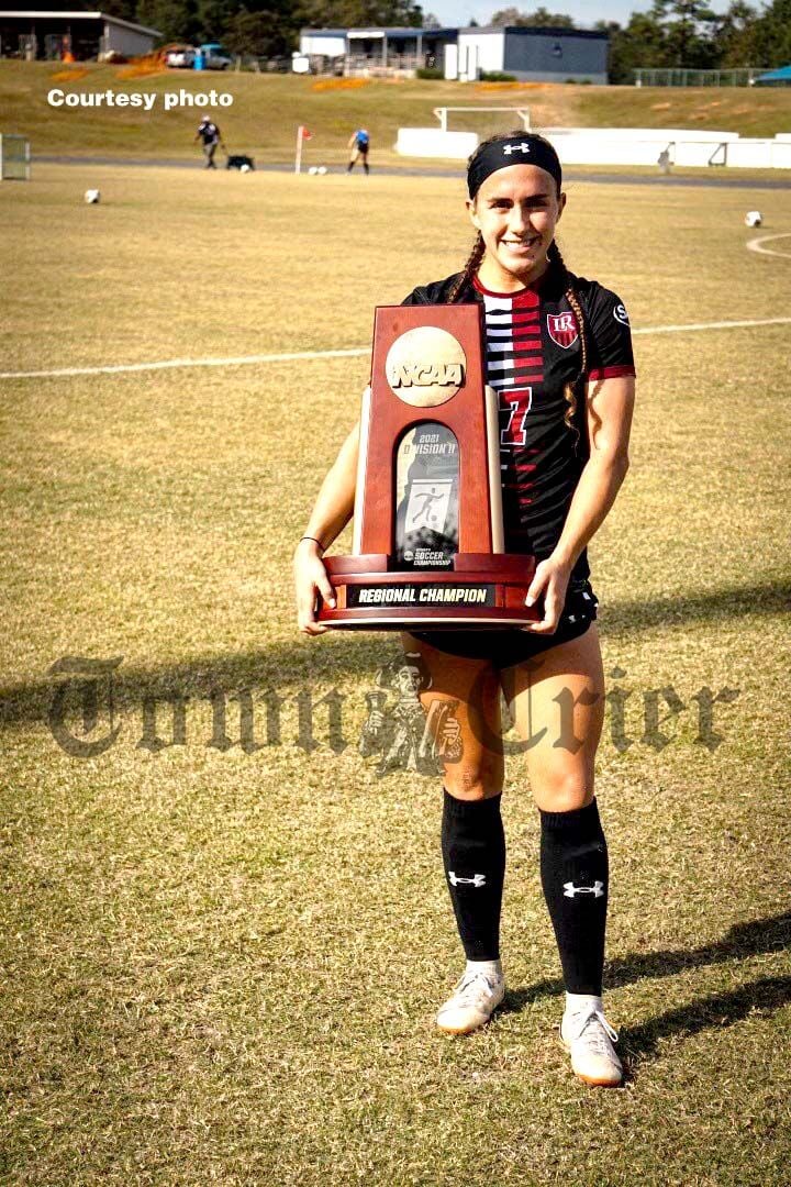 Wilmington's Stephanie Figueiredo with the Regional Champion trophy