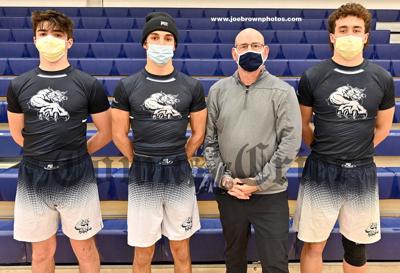 WHS Wrestling team captains with coach Peter Mitchell