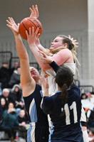 Woburn girls off fast in basketball tourney