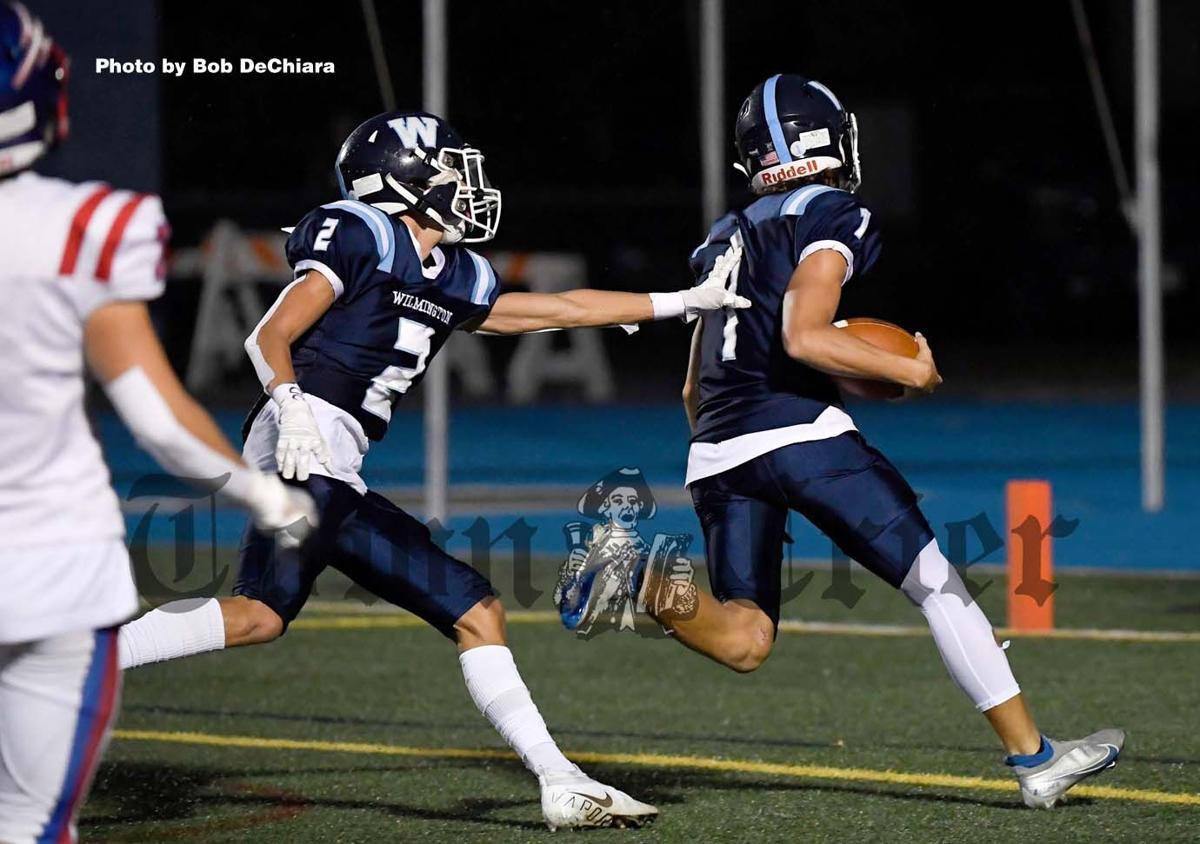 John Germano (2) gives a push to his brother Pedro for the touchdown
