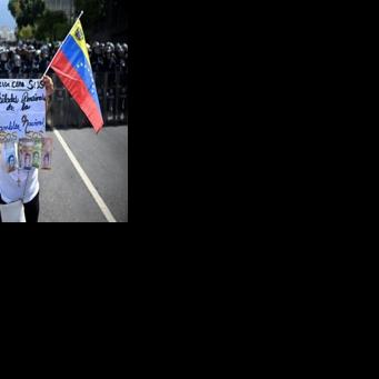 Venezuelan protesters call government wage hike a joke