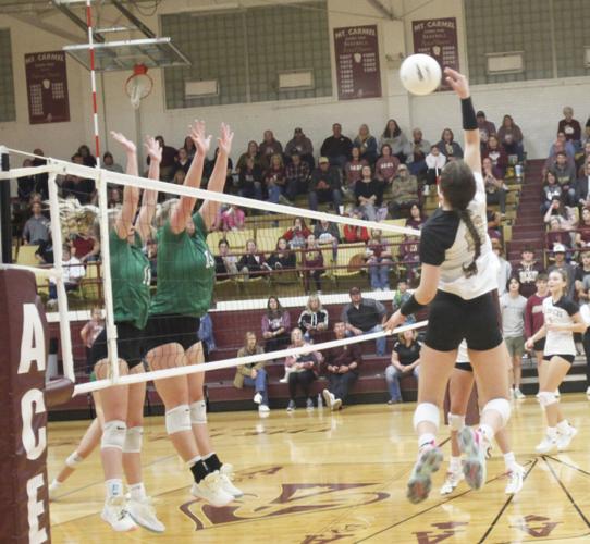 Mt. Carmel Lady Golden Aces spiker's advance to Sectionals Sports