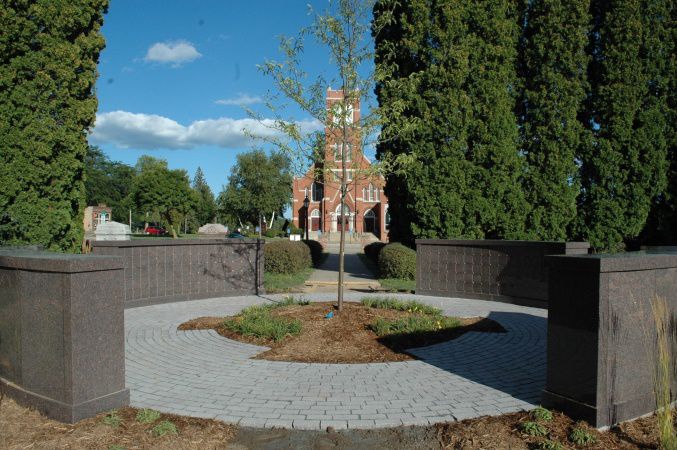 Elim Removes Arborvitae From Scandia Cemetery 