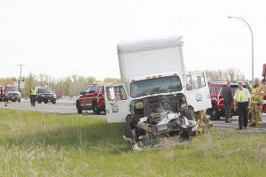 Driver falls asleep behind wheel, hits trucks of local men