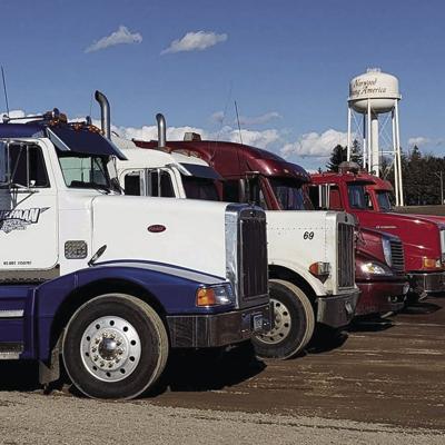 Curfman Trucking and Repair Fleet of Trucks.jpg