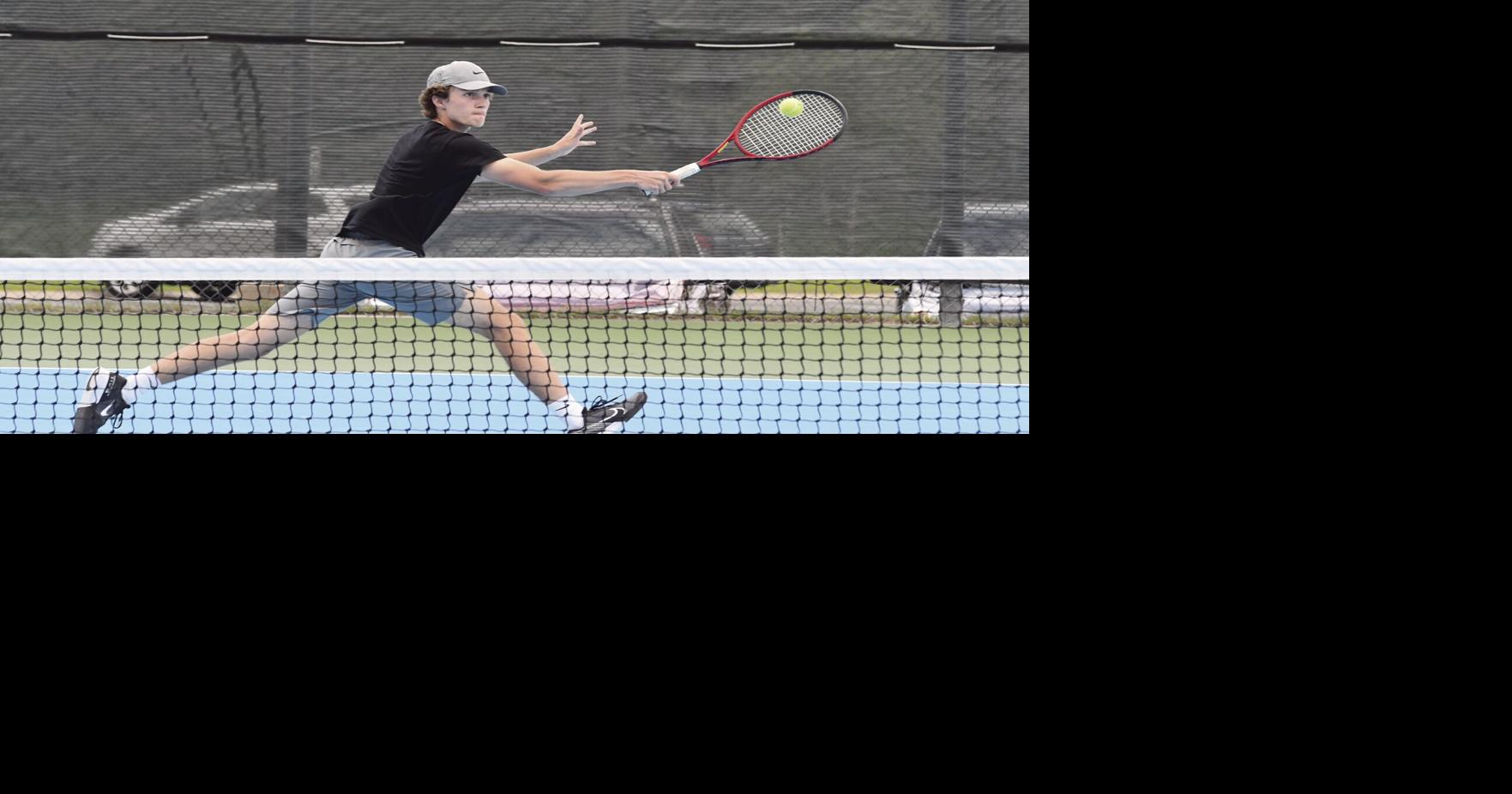 Photo: Reaching for the backhander | Bloomington | hometownsource.com